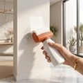 Drum Paint in Hand Rolling on Wall